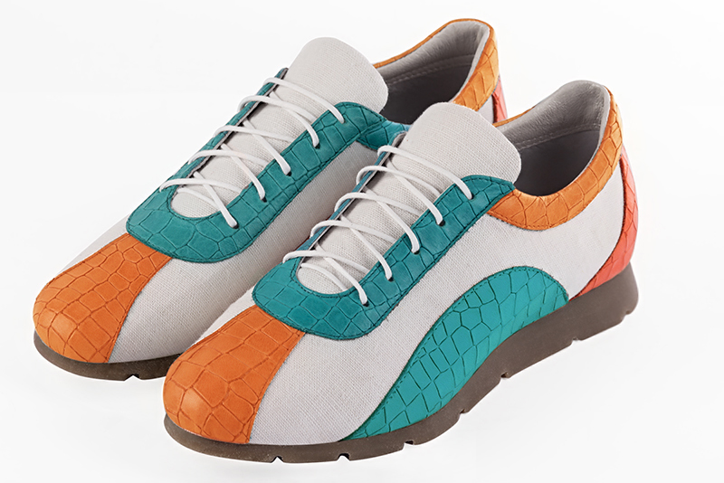 Apricot orange, pure white and turquoise blue women's three-tone elegant sneakers. Round toe. Flat rubber soles. Front view - Florence KOOIJMAN